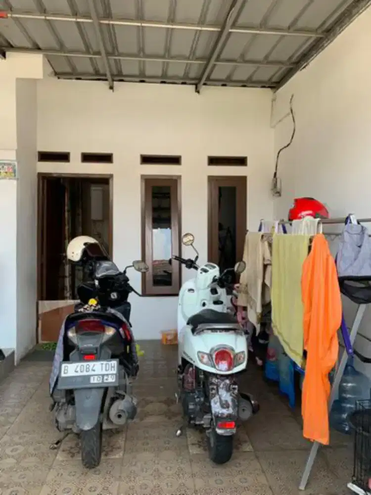 Over kredit rumah