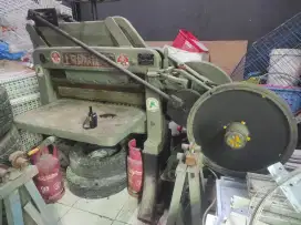 Mesin potong DQ timbul