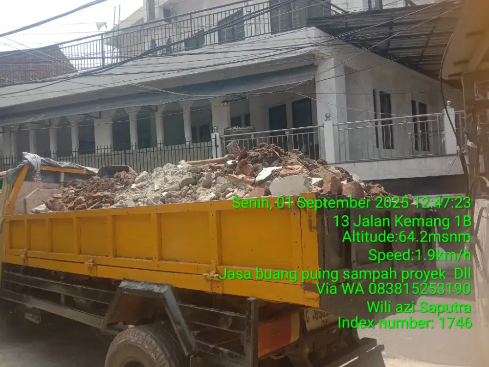Tukang buang puing sampah dll