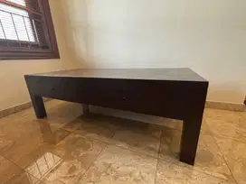 Coffee table in dark wood with two drawers