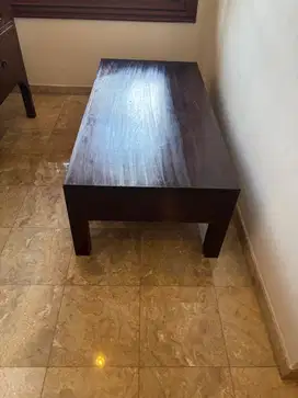 Coffee table in dark wood with two drawers