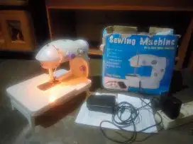 mesin jahit portable