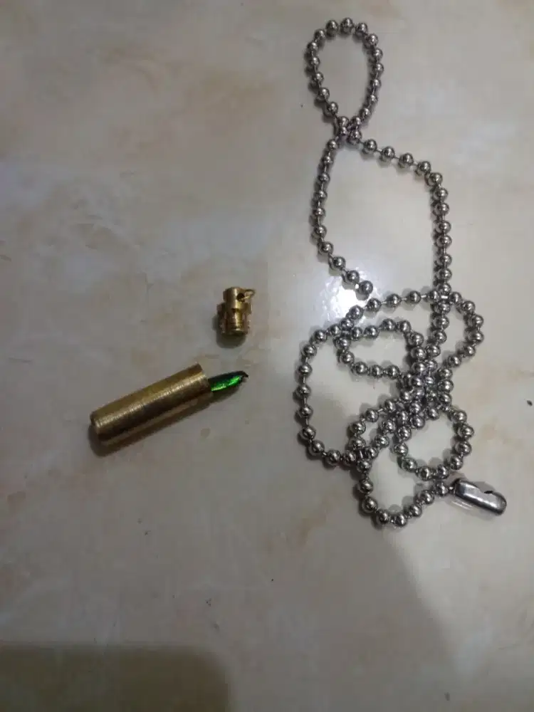 Liontin samber lilin