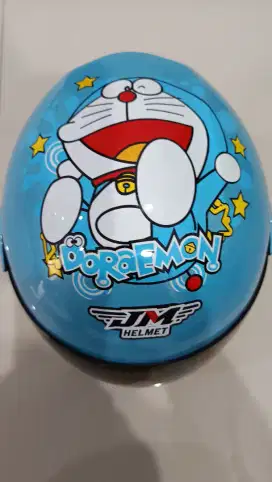 Helm anak bekas rasa baru motif dora emon