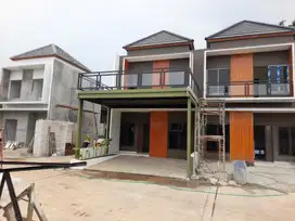 Rumah mewah 2lantai pinggir jalan raya jatiwarna dekat pintu Tol