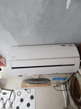 Jual AC midea 1/2pk