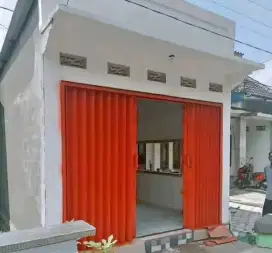 Pintu folding gate rolling door