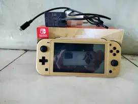 Nintendo switch lite hyrule edition+microSD sandisk 128gb, OFW NO GAME