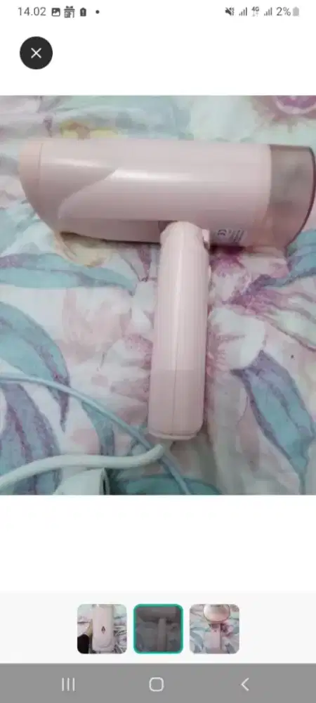 Setrika uap warna pink