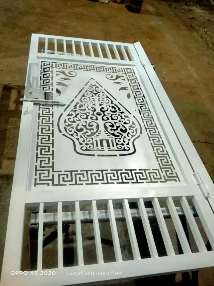 Pagar besi motif hasil cutting laser