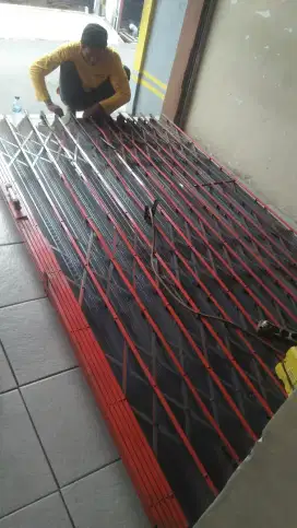 Reparasi servis rolling door folding gate murah