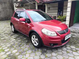 Suzuki SX4 Merah Maroon (MT) 2009