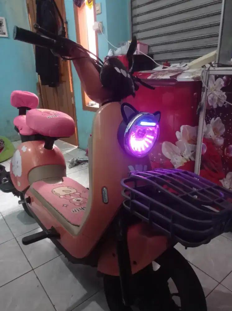 Sepeda listrik winfly pink