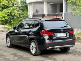BMW X1 sDrive 18i AT 2012 Hitam Metalik  TERAWAT