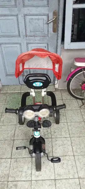 Sepeda roda tiga