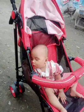 Stoler bayi warna merah