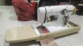 Mesin jahit janome lubang kancing