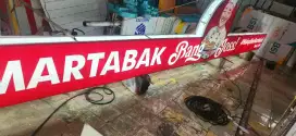 Papan nama neon bok