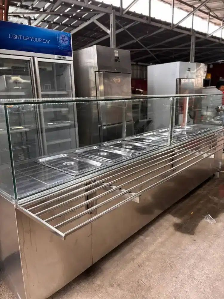 Bain marie/etalase penghangat makanan
Sumber panas dari kompor listrik