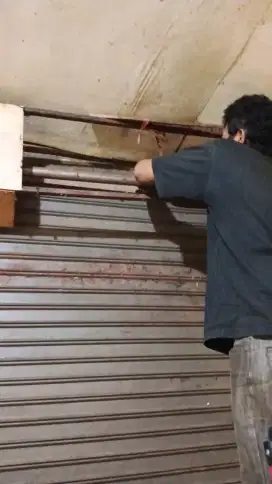 Tukang reparasi rolling door folding gate murah