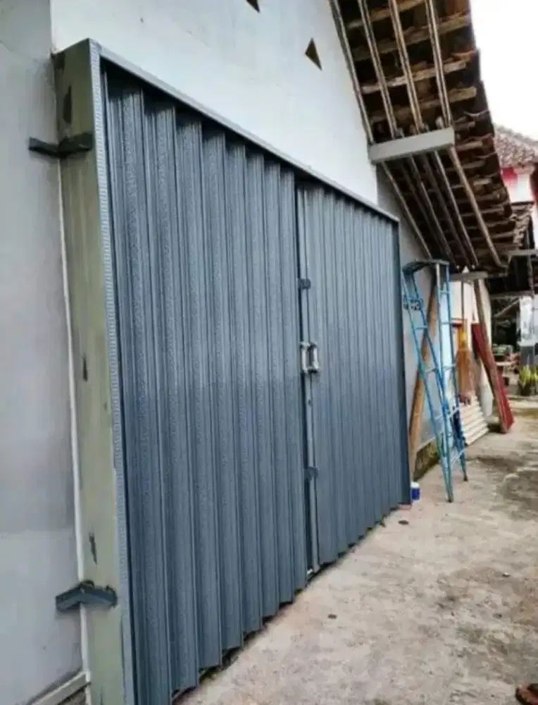Tukang reparasi service rolling door folding gate murah