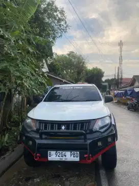 Triton 4x4; double cabin, Mitsubishi