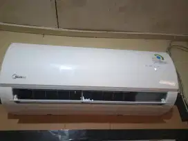 Ac midea 1/2 pk  seken bergaransi resmi