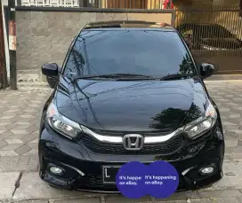Brio satya type E tahun 2021,km 10106 on going,warna hitam,Plat L