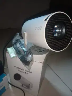 Jual BU proyektor mini merek XGODY gimbal 3,+speker blutut.