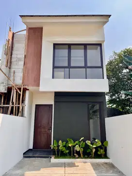 DIJUAL RUMAH MODERN TANAH LUAS DEKAT PINTU TOL 5 MENIT BEBAS BANJIR SH