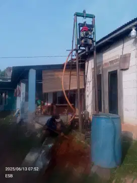 Tukang bor sumur