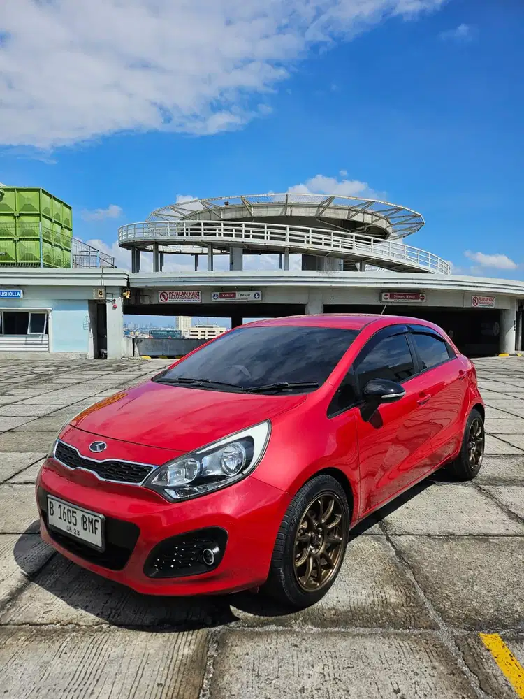 Kia Rio 1.4 AT (Automatic) 2013 Merah, Pjk bln 8/26 (Promo TDP 20jt)
