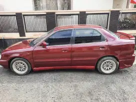Di Jual Mobil Sedan Suzuki Baleno Tahun 1996