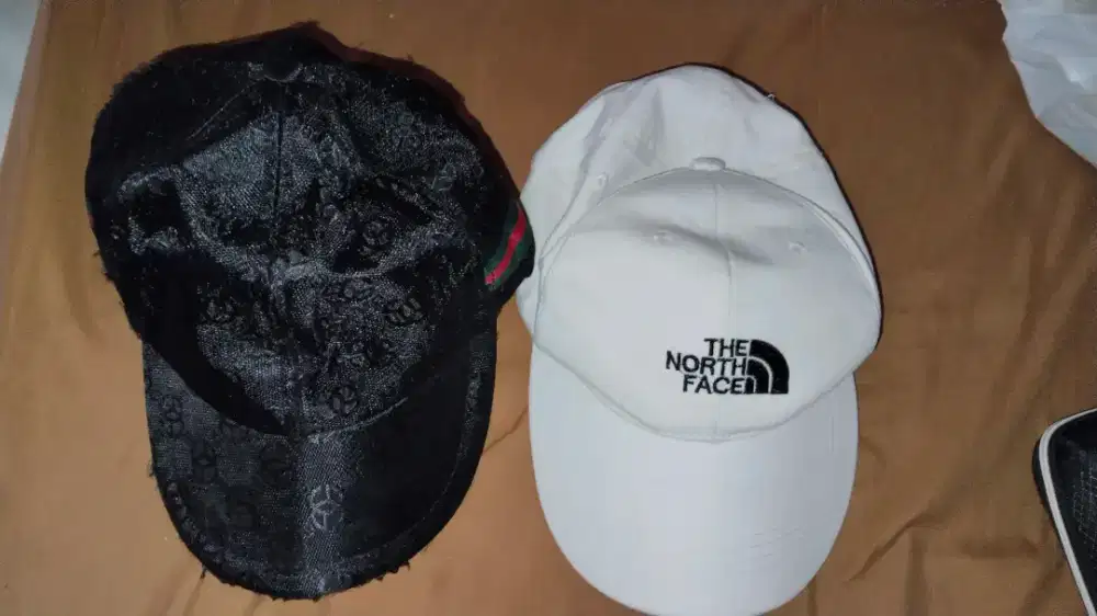 Topi gucci dan TNF