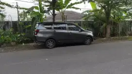 sigra x delux a/t