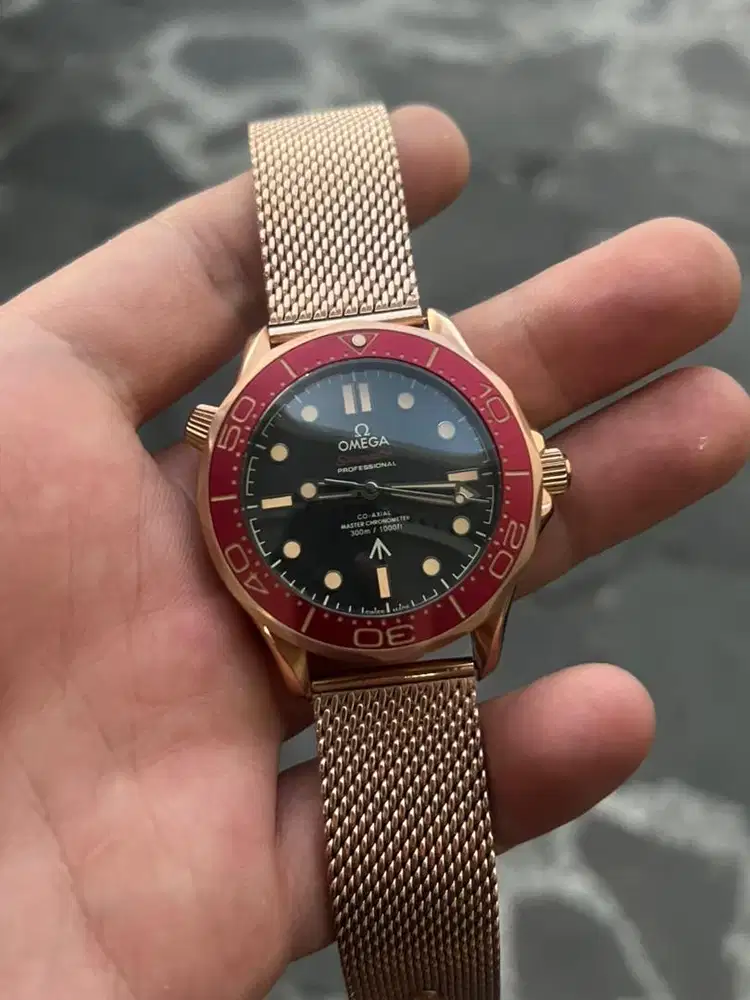 JAM OMEGA RED OTOMATIS