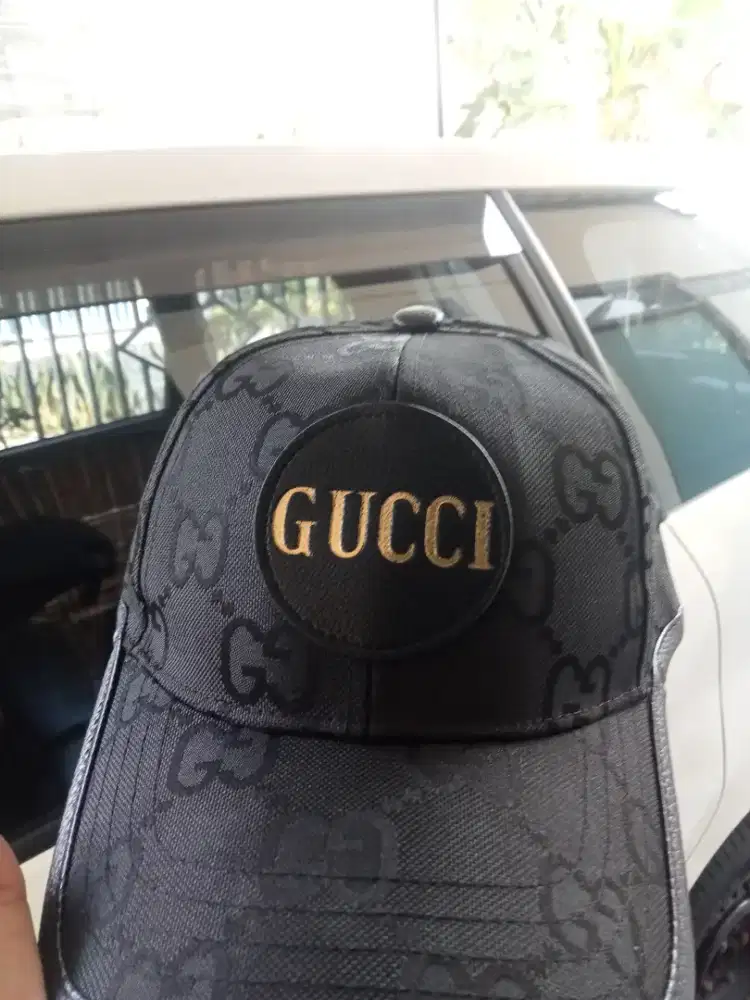 Topi gucci pria