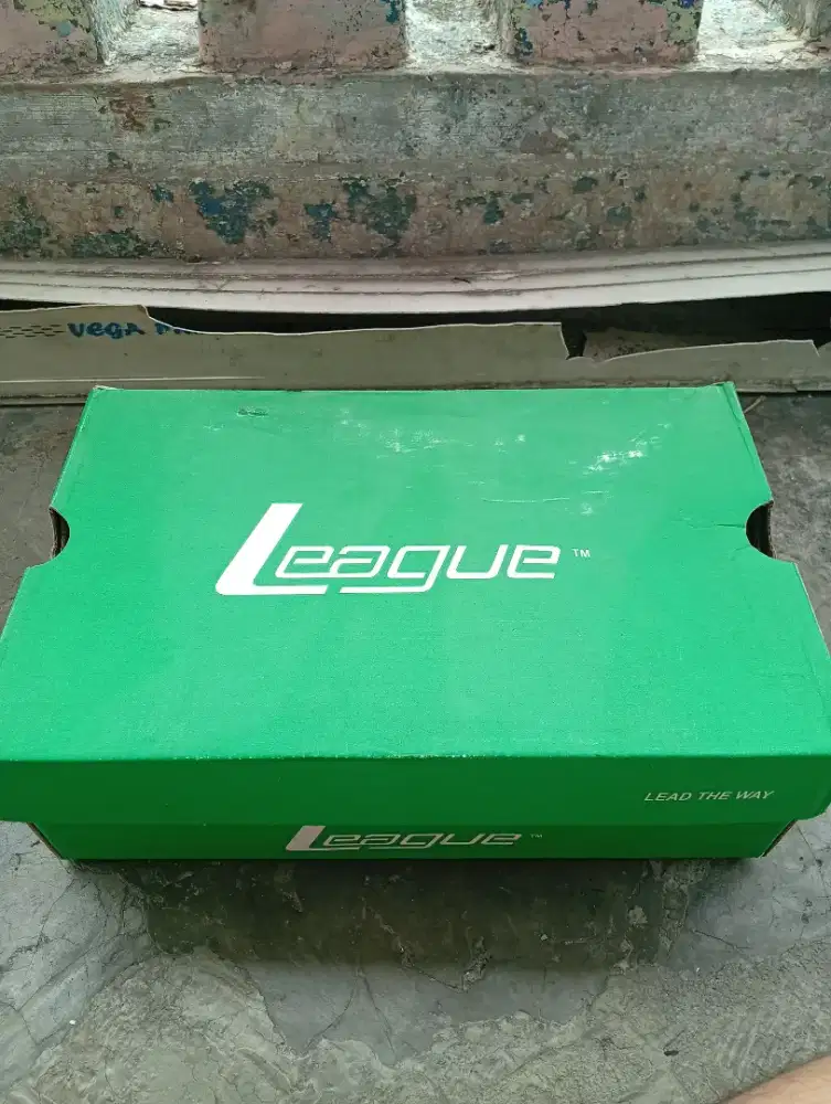 Sepatu League TM