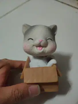Pajangan mobil kucing