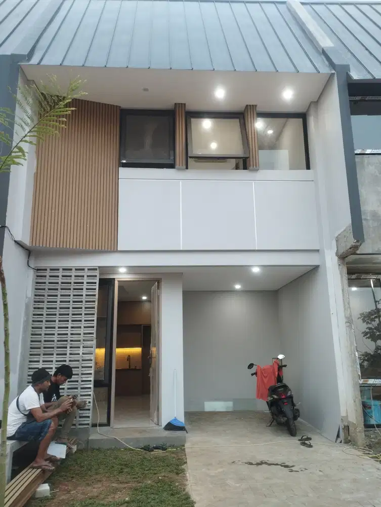 Rumah 2 lantai 3 kamar tidur,dekat pintu toll limo DP ringan