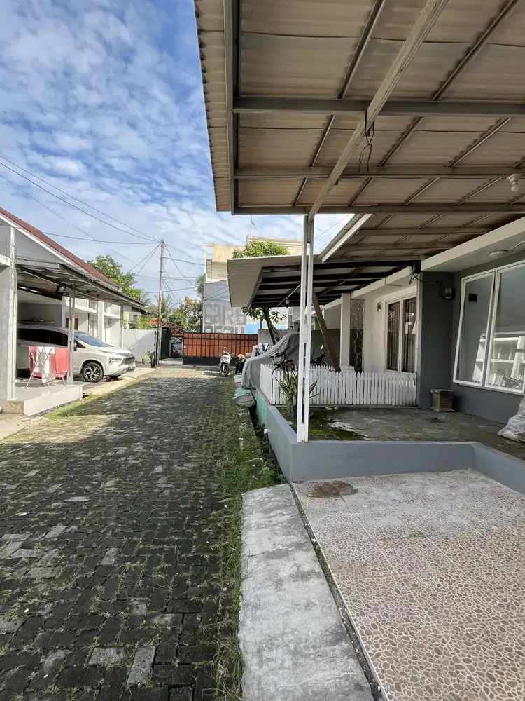 Rumah nempel sekolah citra negara tanah baru Beji Depok