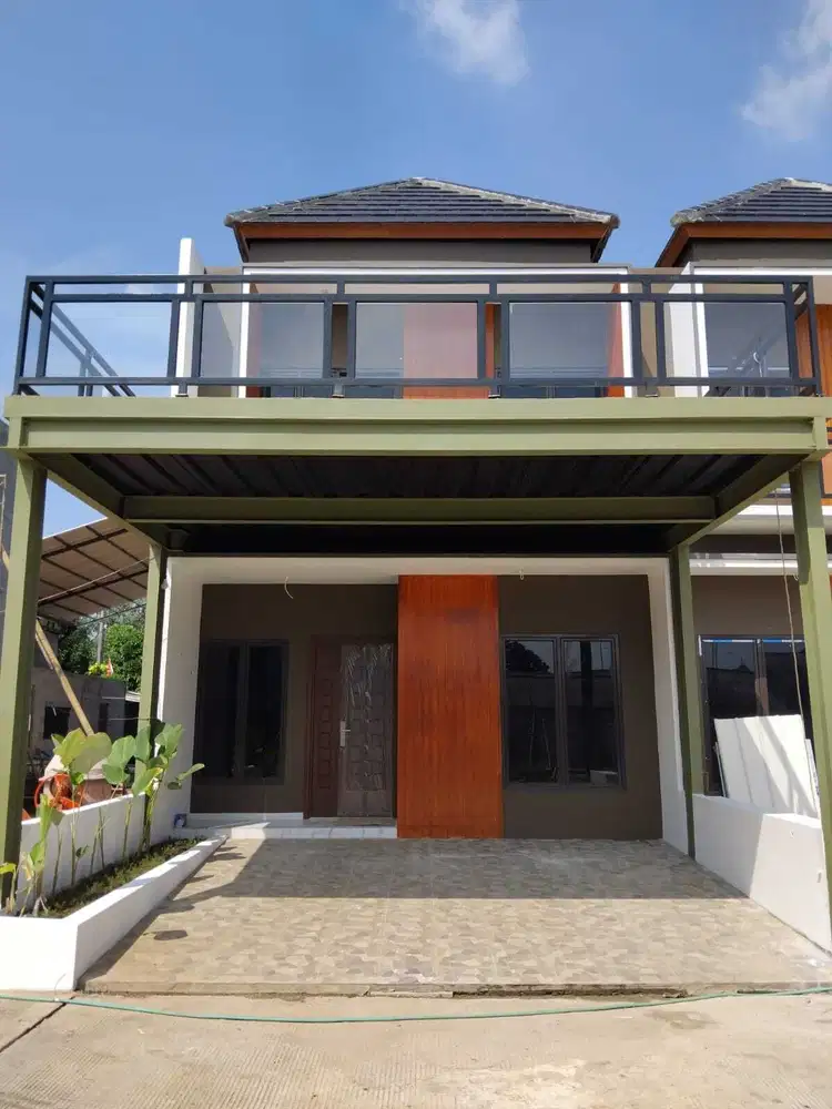 RUMAH CLUSTER PREMIUM DI PINGGIR JALAN RAYA
