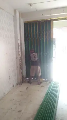 tukang servis rolling door folding gate