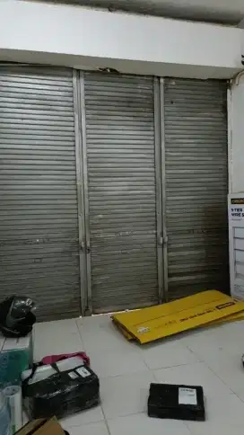 spesialis servis rolling door murah