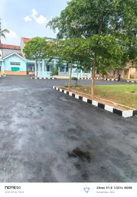 Aspal hotmix jalan .
