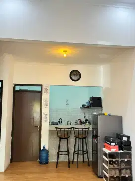 Di kontrakan per tahun
