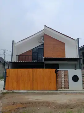 Rumah murah di Depok . Akses mobil. Dekat ke jalan raya.