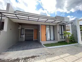 RUMAH MODERN KEKINIAN 800JT-an DALAM CLUSTER DI MLATI SLEMAN