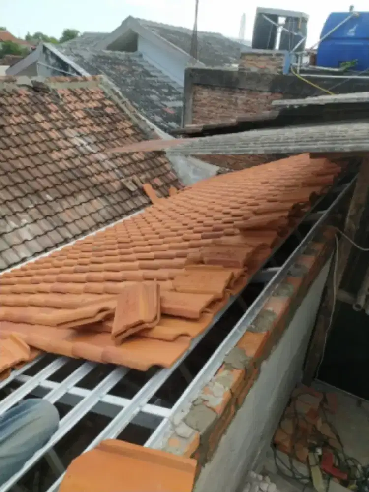 JASA TUKANG PERBAIKAN ATAP BOCOR DINDING DAK REMBES TALANG AIR