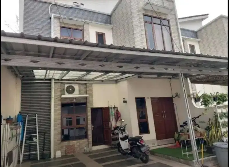 Rumah Pondok aren dalam cluster bebas banjir
